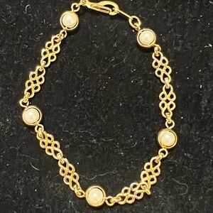 Elegant Vintage Unsigned Monet Gold-Tone Filigree Bracelet with Pearl Accents
